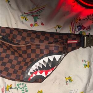 Sprayground Brown Checkered Belt Bag with Shark Motif